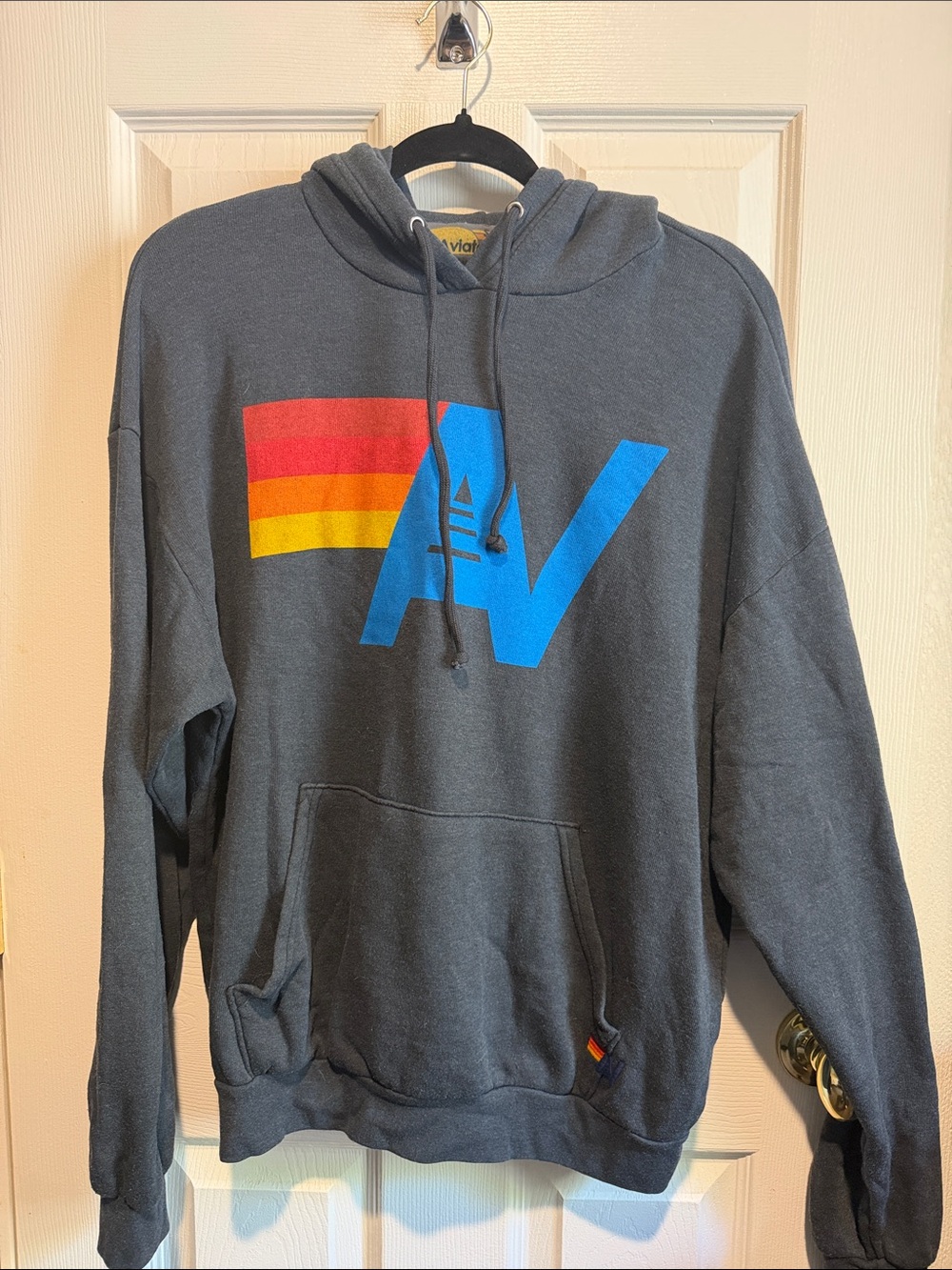 Aviator Nation Charcoal Hoodie with Blue AV and Red-Orange-Yellow Stripe